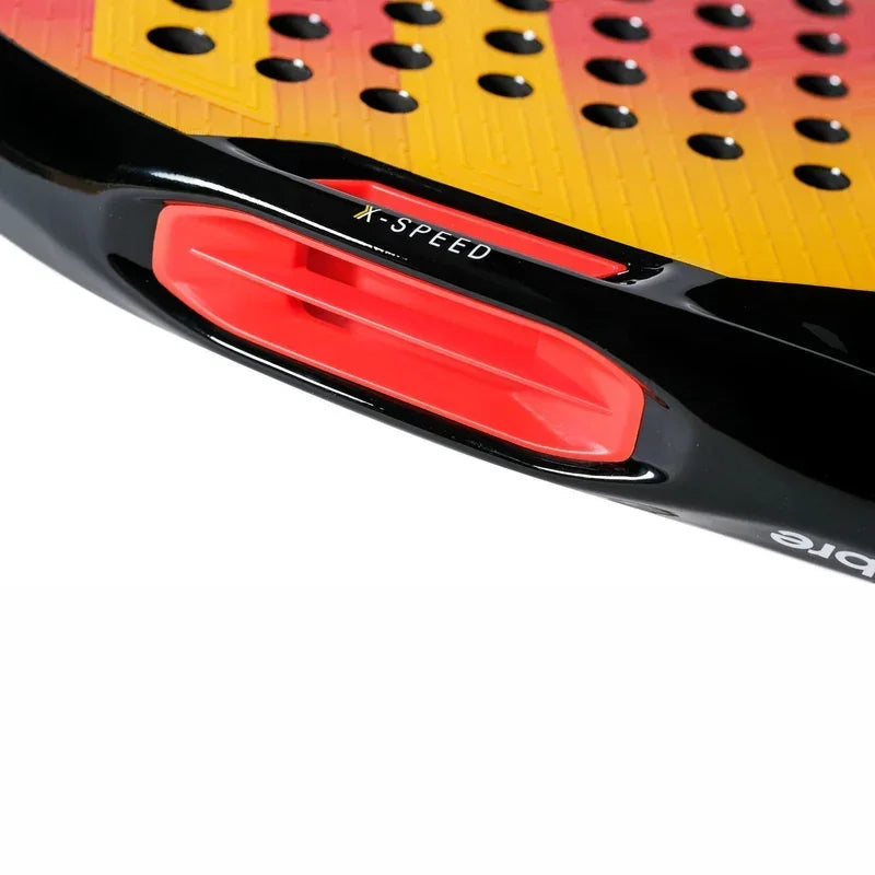 Close-up of a padel racket showing the X-SPEED feature and red accent detail.