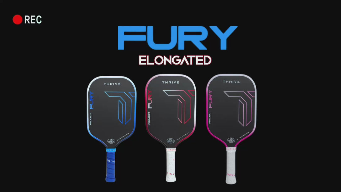 Three Thrive Fury Elongated pickleball paddles in blue, red, and purple on a black background.