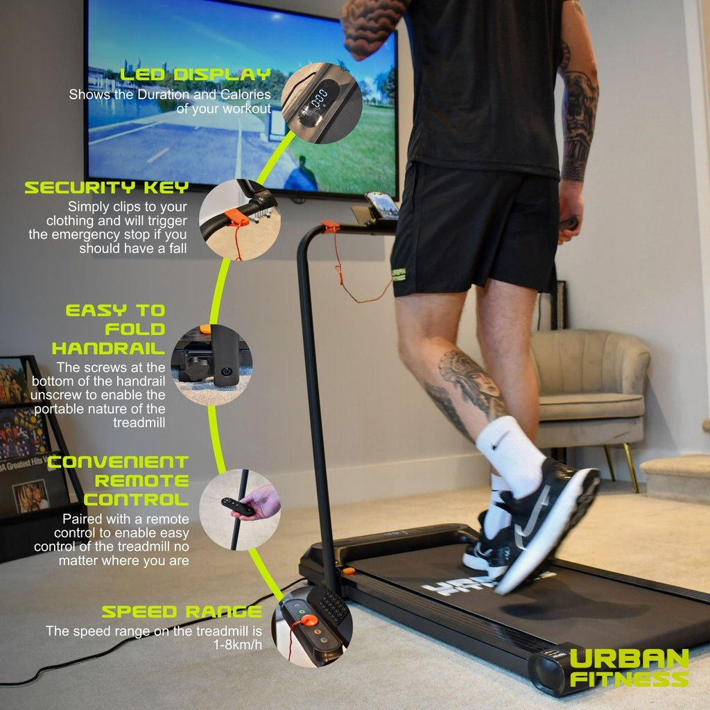 Man walking on Urban Fitness treadmill indoors, with LED display, remote, foldable handrail