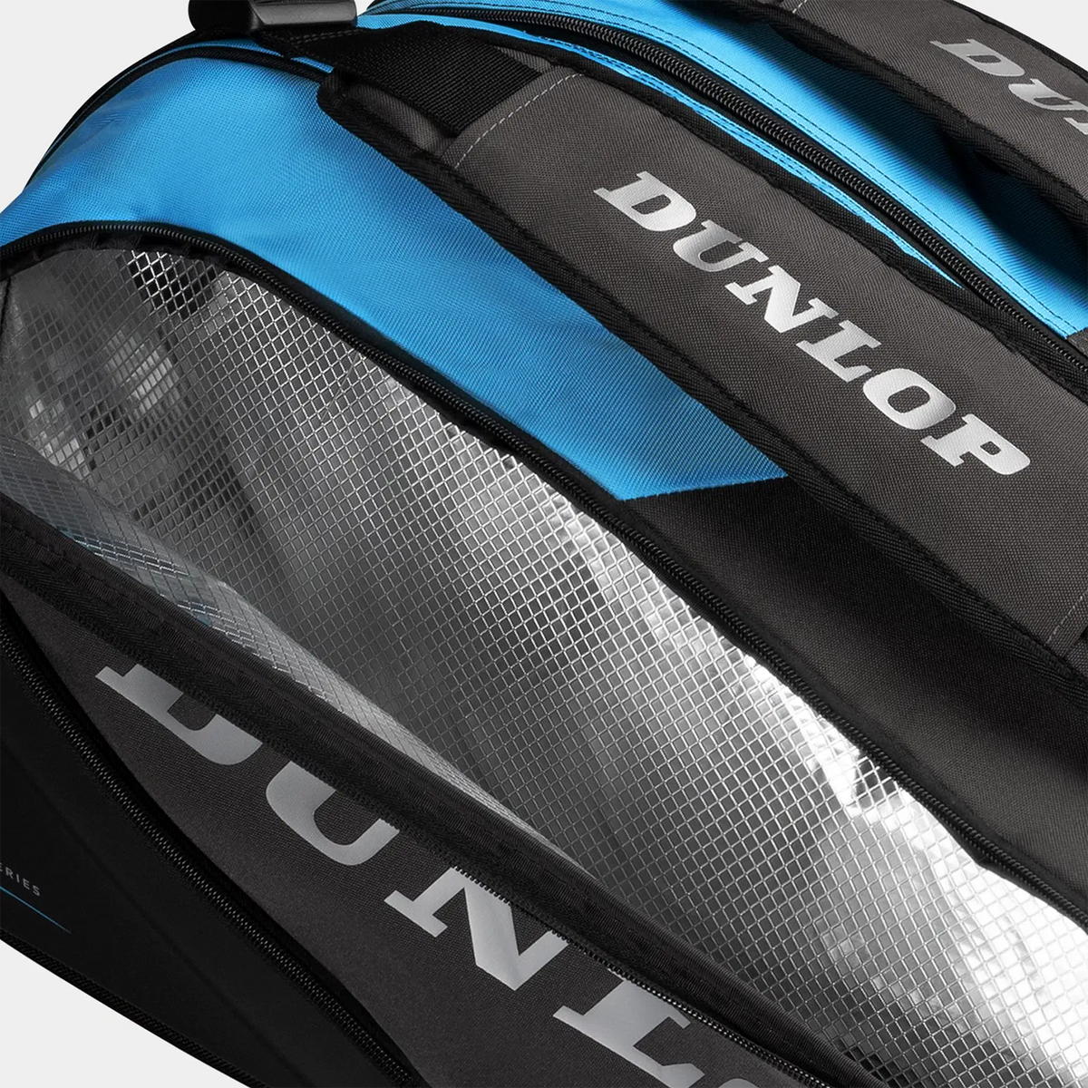 Close-up of a blue and black Dunlop tennis bag with a thermal lined compartment.