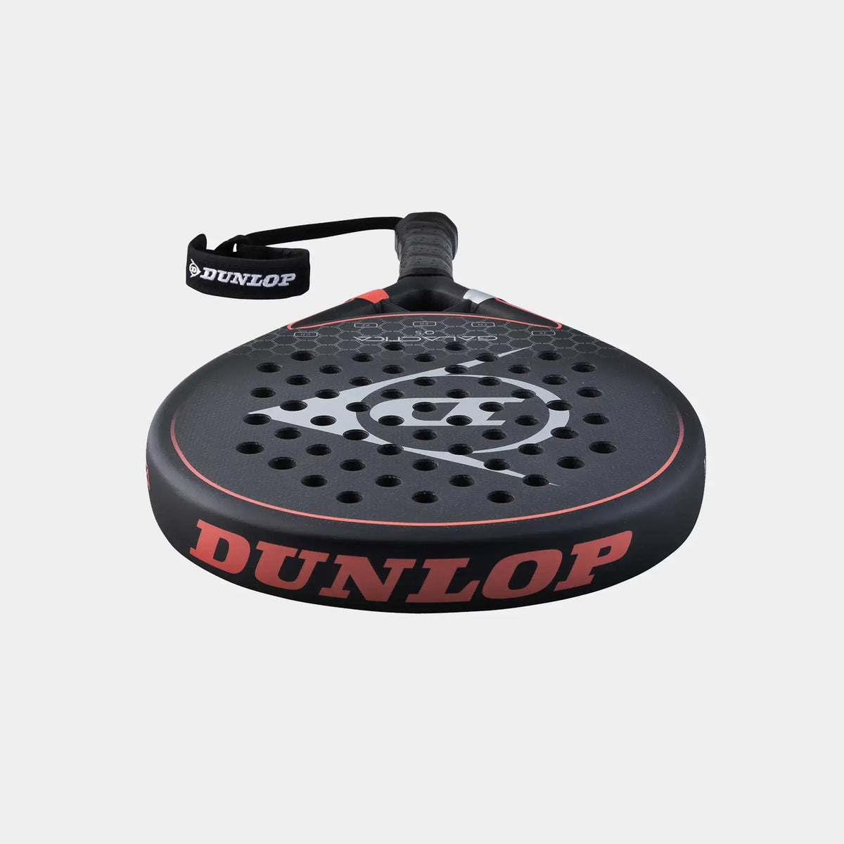 Black Dunlop padel racket with red branding and perforated surface